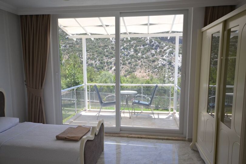 Kalkan Villa 1071'de 4 Yatak Odalı Lüks Villanızı Kiralayın