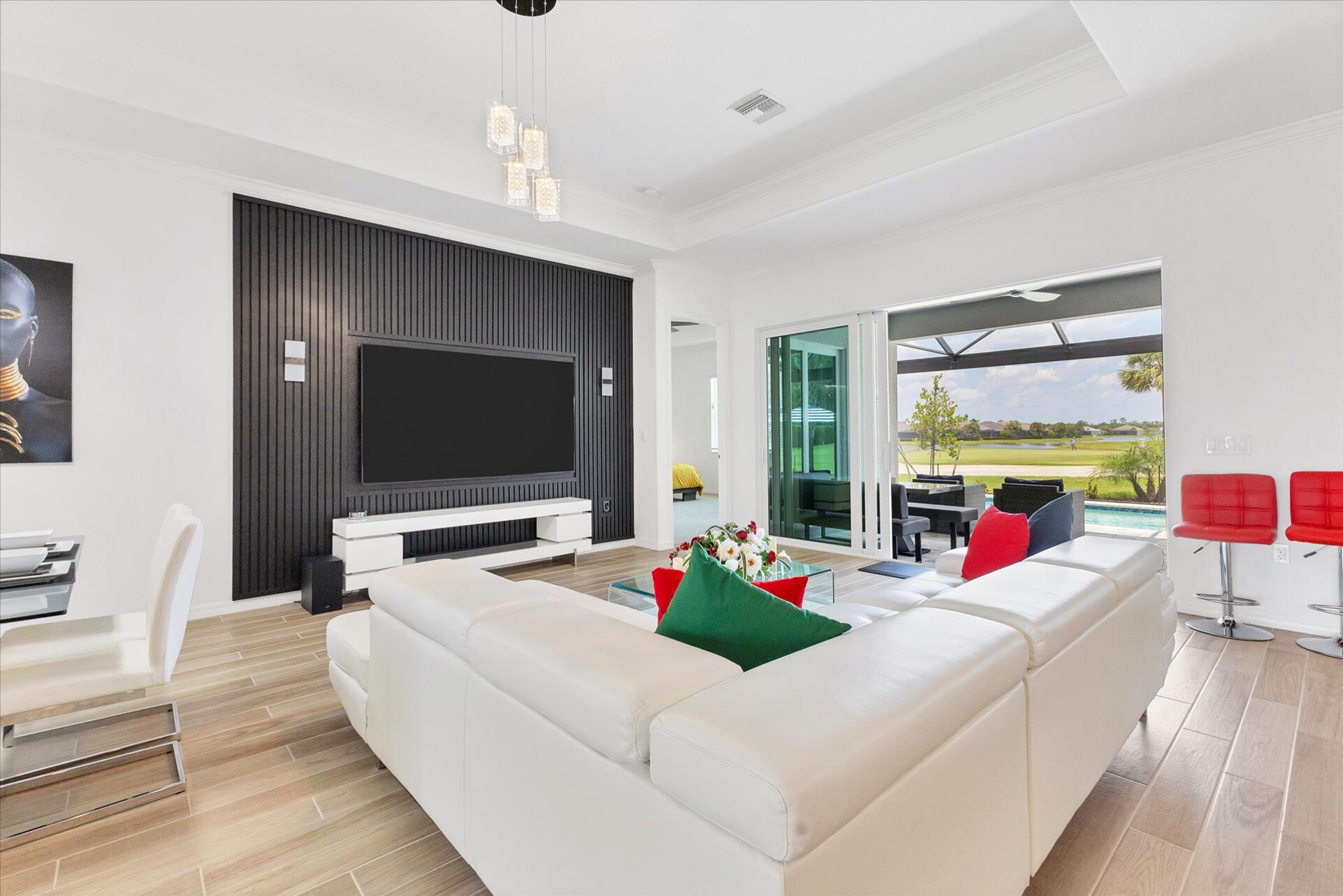 Bright, open living space overlooking the private pool
