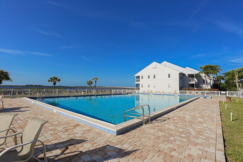 Community pool overlooks the river