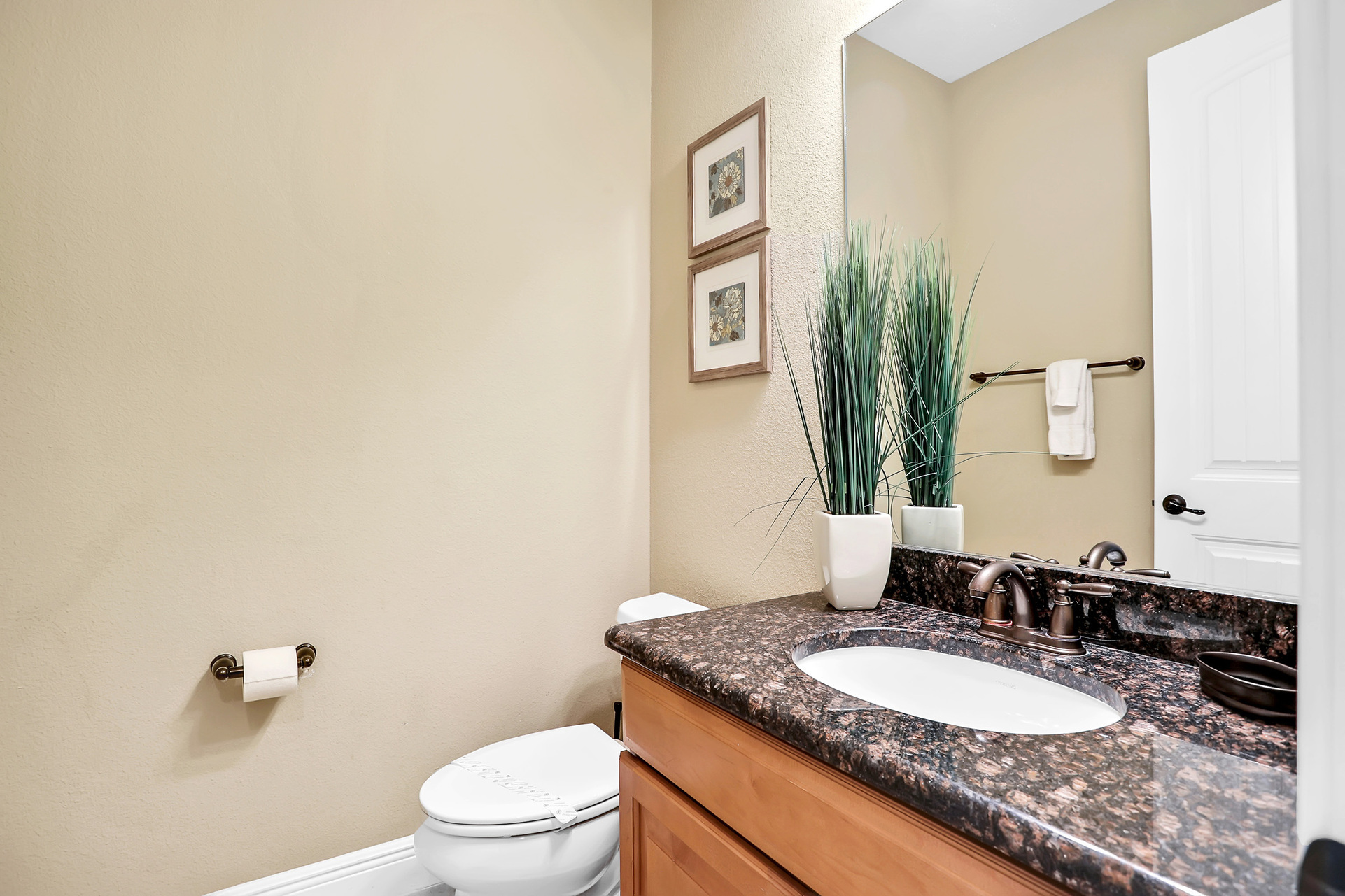 The half bathroom is located on the first floor