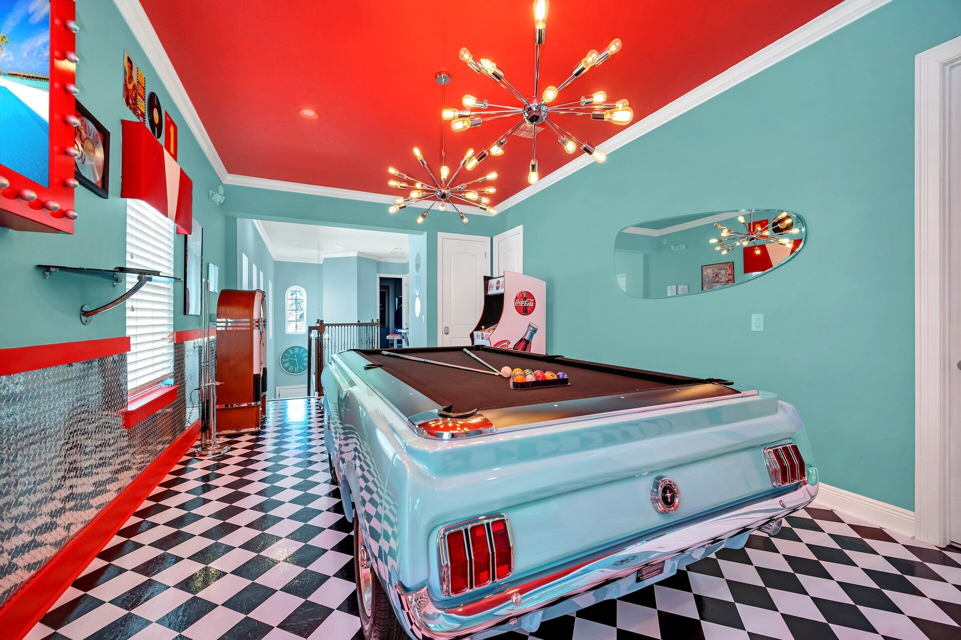 The pool table is an authentic Ford Mustang