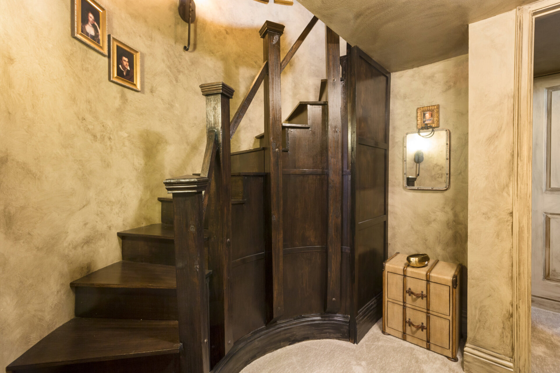 Head towards the secret kids` zone in the spiral stair case