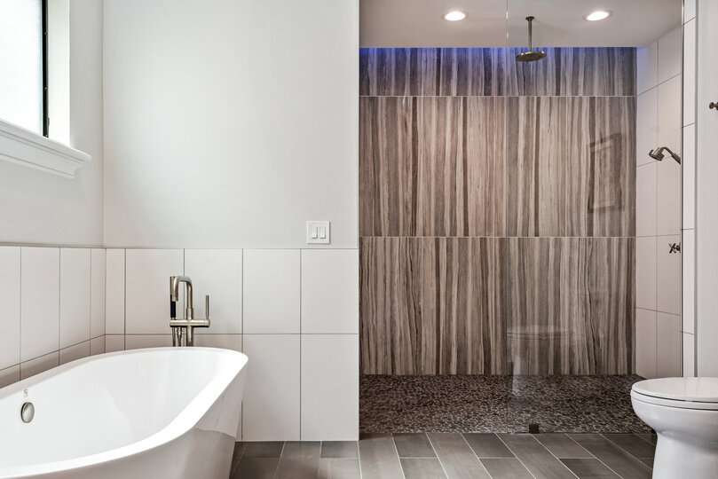 With a garden bathtub and waterfall shower
