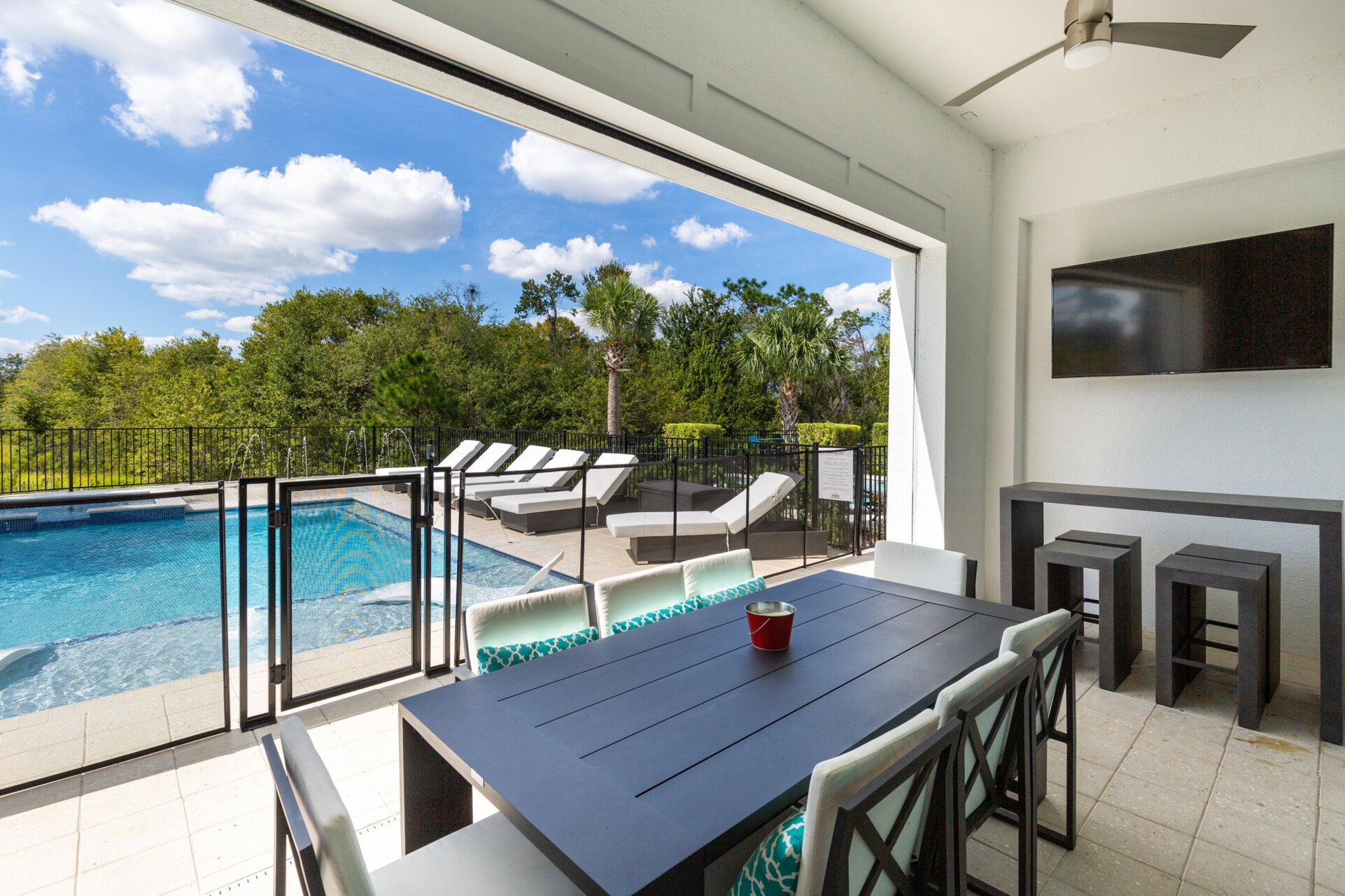 A pool fence surrounds the area for optimal safety