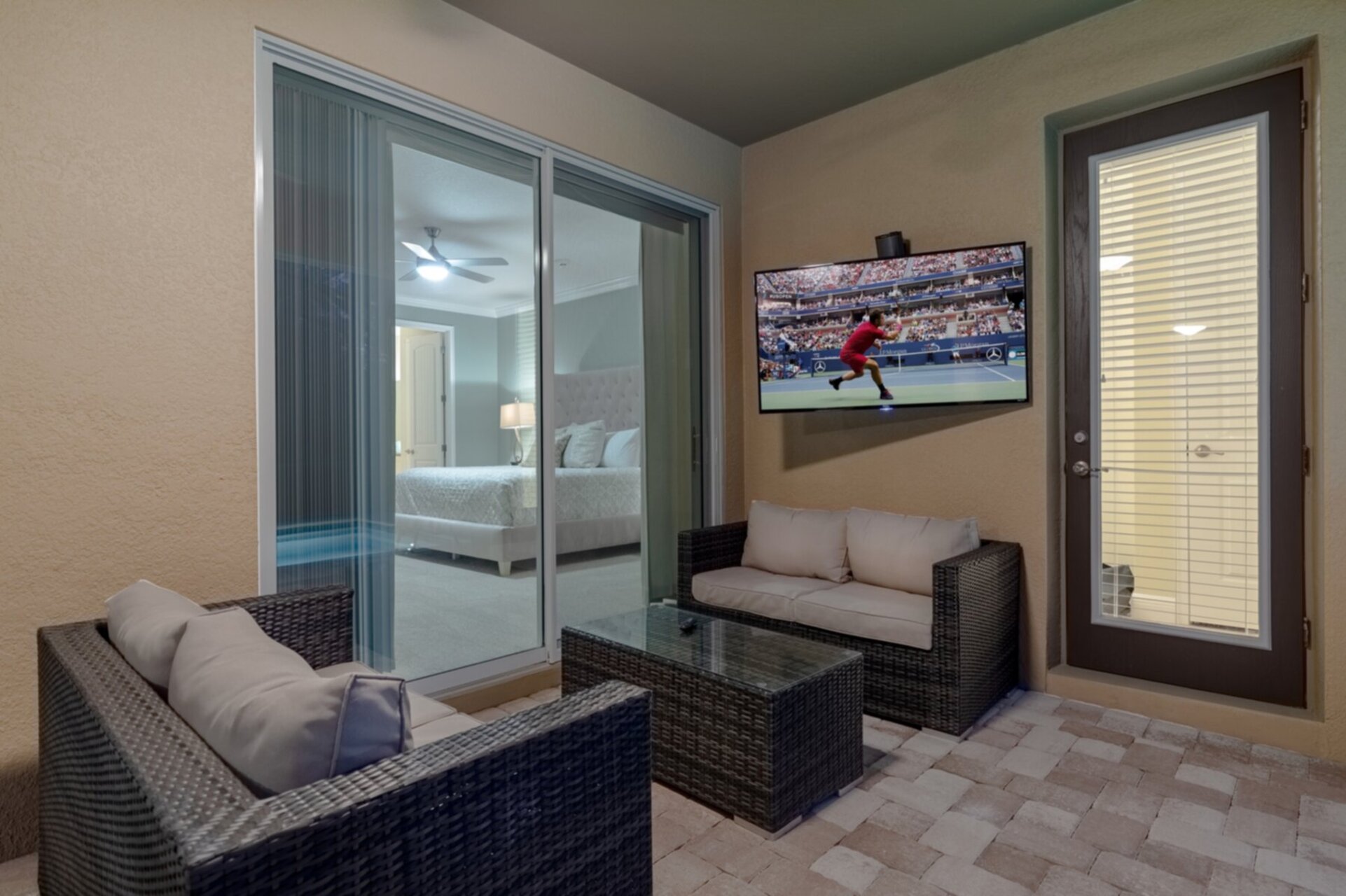 Lounge on comfortable patio furniture, complete with an outdoor TV