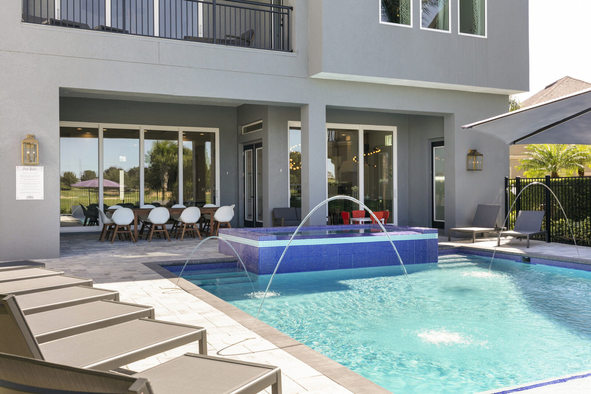 Cool off under the pool fountains