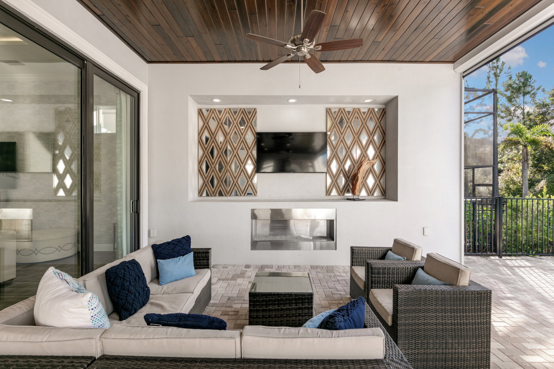 The pool patio has everything you could think of (Disclaimer: Fireplace(s) not allowed for guest use, homeowner use only.)