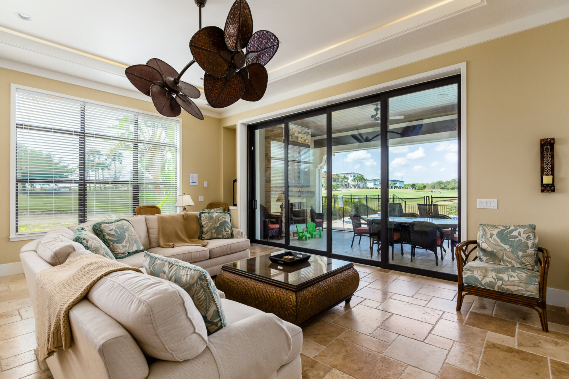 Slide open the large glass doors to access the private patio