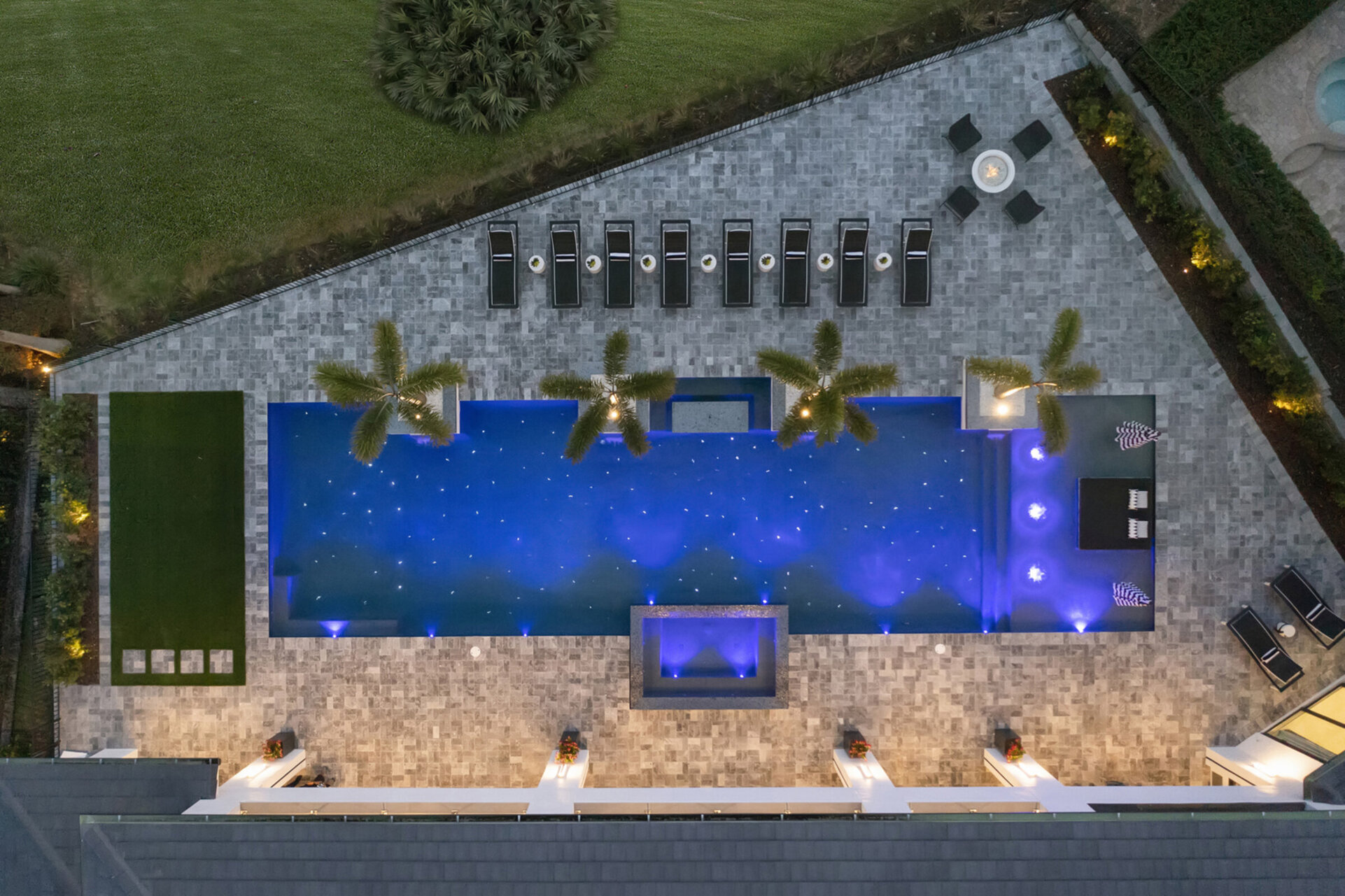 Spend your days and nights sitting by the pool and enjoying the spillover spa
