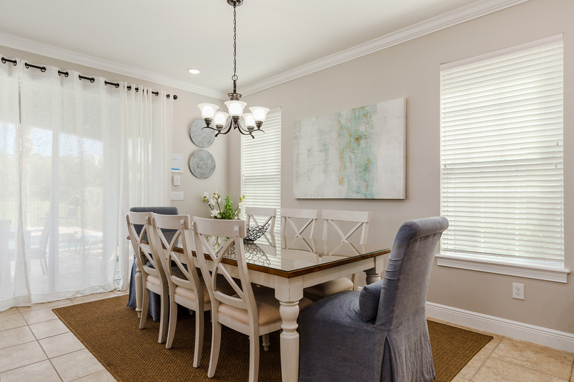 The dining table has seating for 8.