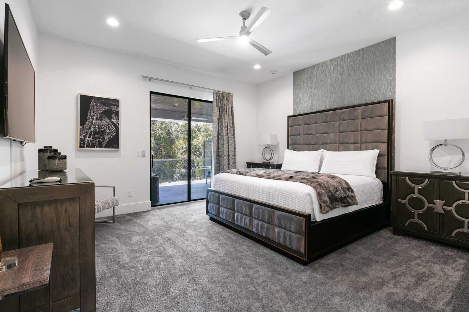Master Suite bedroom furnished with a king-size bed, with balcony access
