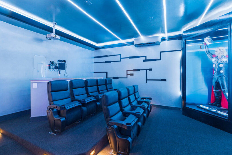 Featuring 9 comfortable recliners, 4 seats at the bar, a 120 inch movie screen, Apple TV 2 and PS4