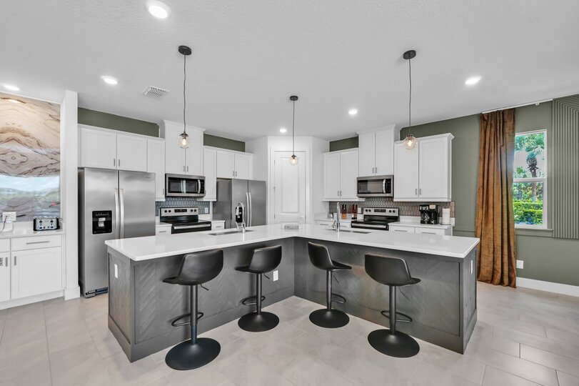 Enjoy casual meals at the breakfast bar or entertain guests in the adjoining dining space