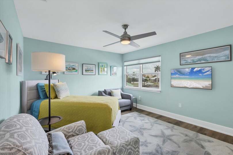 Upstairs twin bedroom with 43-inch Smart TV