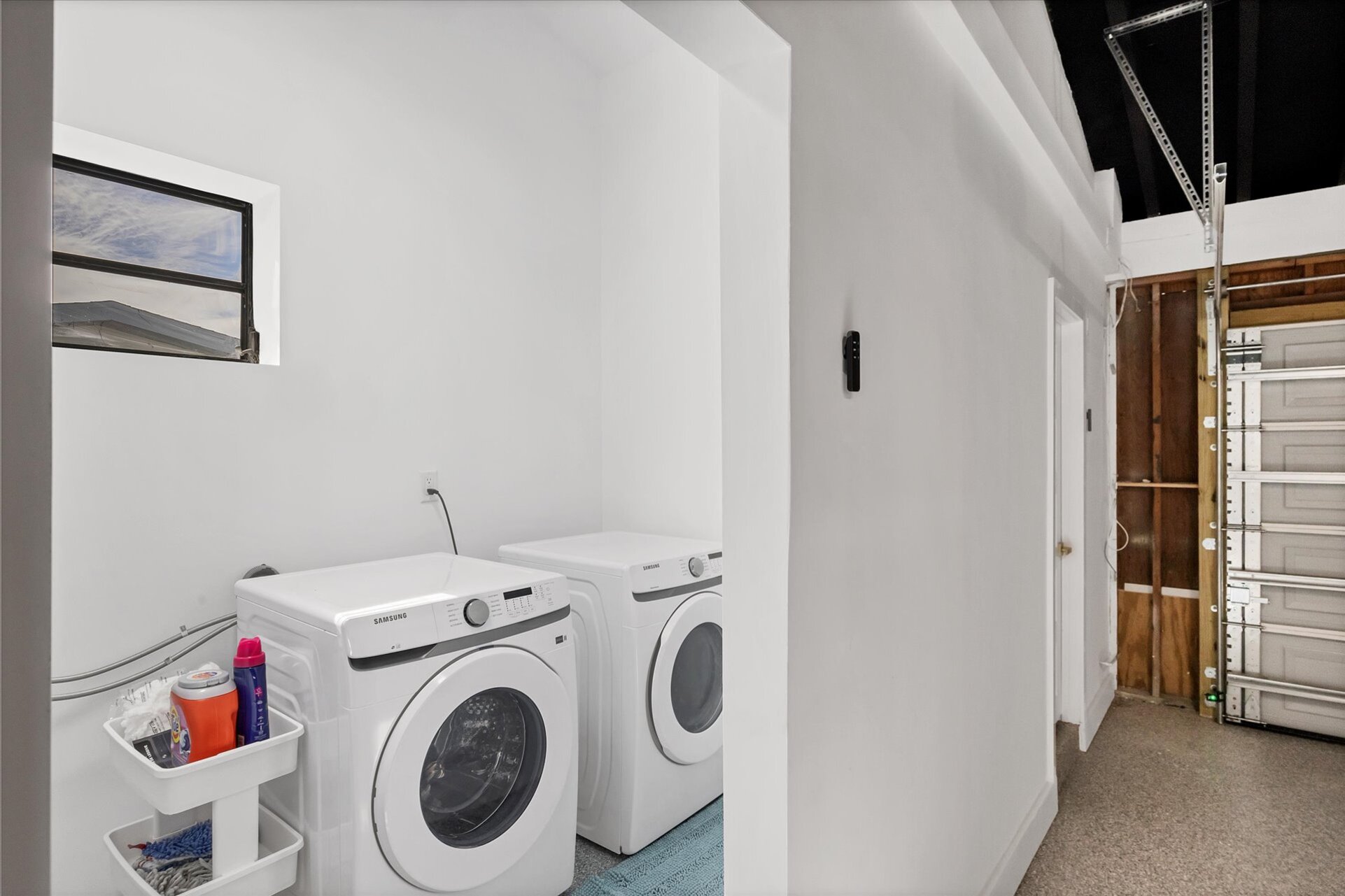 Laundry off of garage with full-size washer & dryer