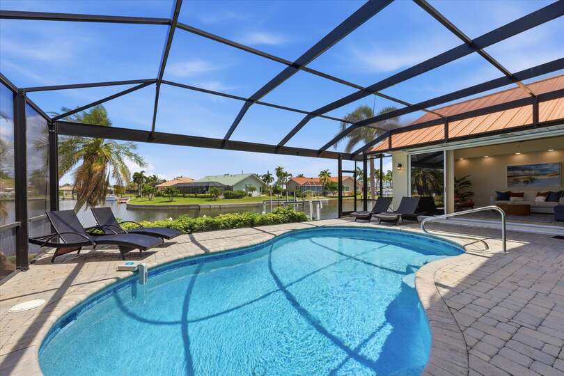 Sparkling pool overlooking the canal. Pool size 25' x 13' x 6'D