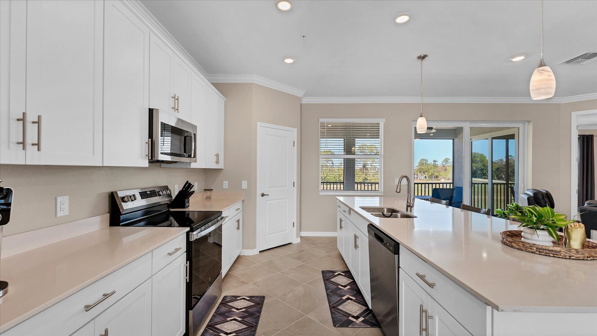 Gorgeous, fully-equipped kitchen with all new appliances and large kitchen island that seats 4