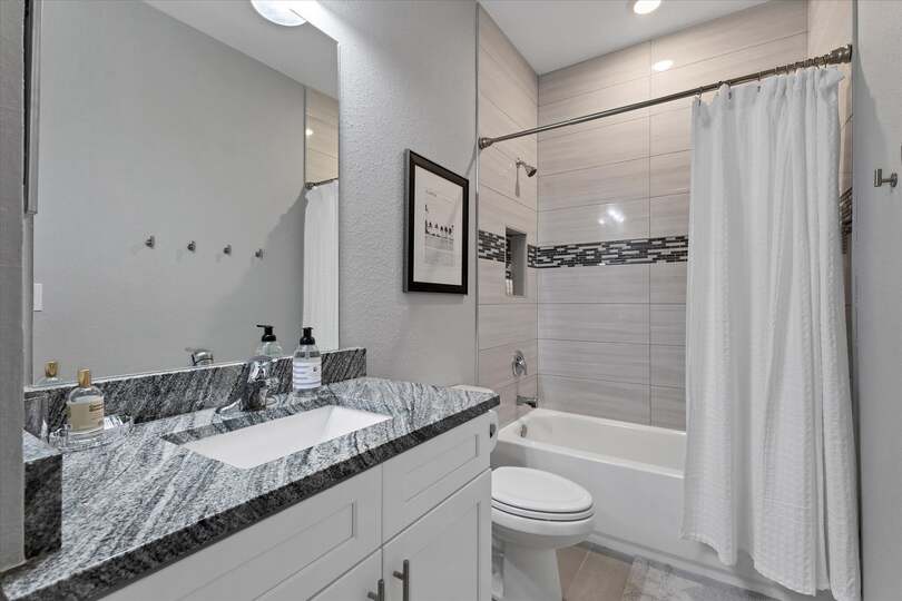 Guest bathroom with shower/tub combo