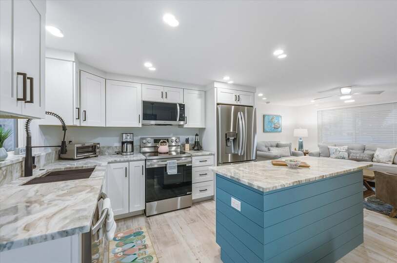 Bright, open, fully-equipped kitchen