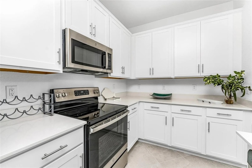 Beautiful, full-equipped kitchen overlooking living and dining areas