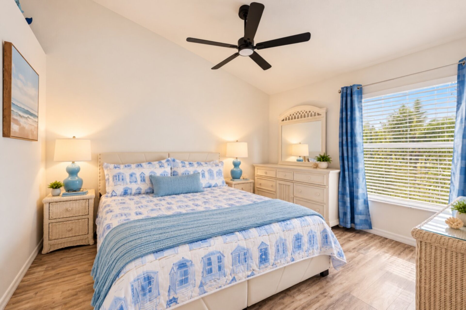 Primary bedroom with king bed, attached bathroom and 37-inch TV