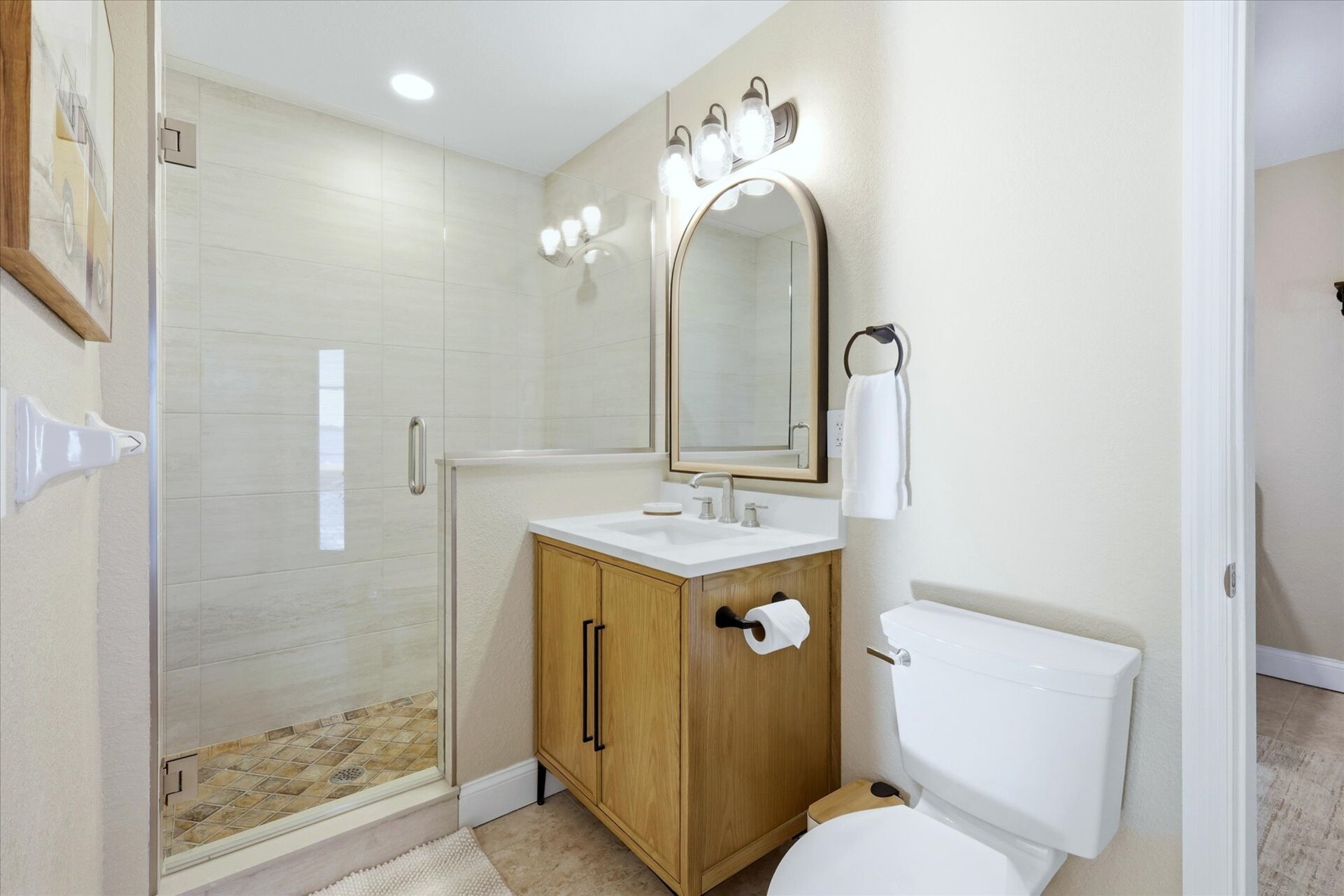Downstairs guest bathroom 2 (attached to bedroom 4) with walk-in shower, and lanai access
