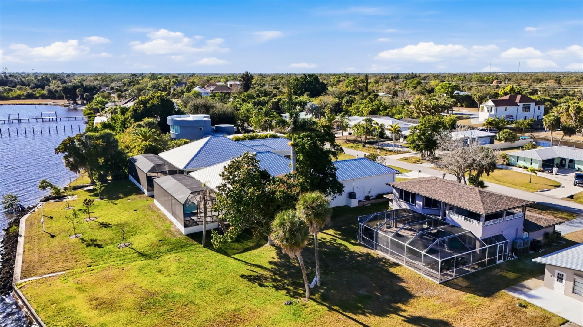 Gorgeous 4 bedroom, 3 bathroom, 2 story waterfront home with private pool on Peace River in Punta Gorda, FL