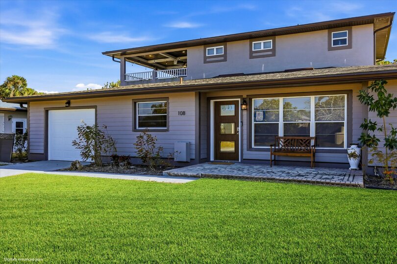 Gorgeous 4 bedroom, 3 bathroom, 2 story waterfront home with private pool on Peace River in Punta Gorda, FL