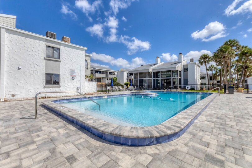 Large community pool overlooking Venice Beach and the Gulf